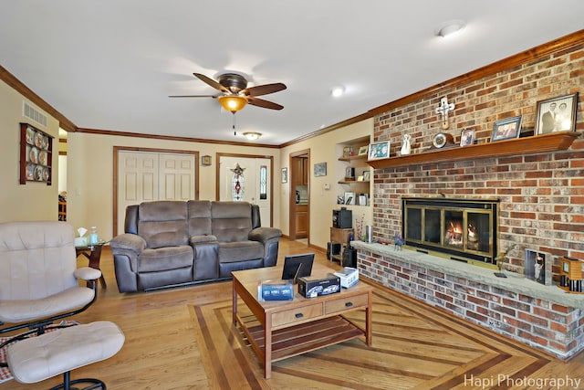 1415 Arabian Spur, Mchenry, IL 60051 - living room with crown molding, ceiling fan, a brick fireplace, and wood finished floors