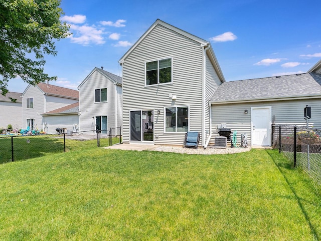 2455 Hillsboro Ln, Montgomery, IL 60538 - rear view of house with a fenced backyard