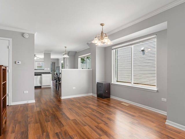 2455 Hillsboro Ln, Montgomery, IL 60538 - unfurnished living room featuring ornamental molding, dark wood finished floors, a chandelier, and a ceiling fan