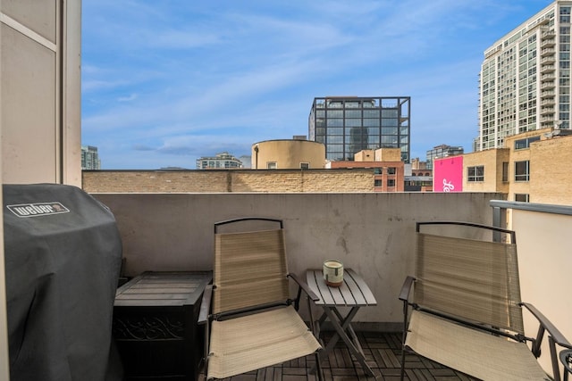 630 N Franklin St Unit 618, Chicago, IL 60654 - view of patio featuring grilling area and a view of city