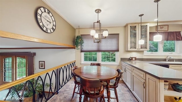 416 S Royal Ct, Palatine, IL 60067 - dining room featuring plenty of natural light, a chandelier, ornamental molding, and stone finish floors