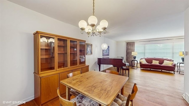 416 S Royal Ct, Palatine, IL 60067 - dining room featuring a chandelier and light wood-style flooring