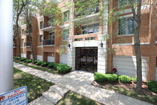 4330 N Neva Ave Unit 411, Norridge, IL 60706 - view of apartment building / complex with a garage