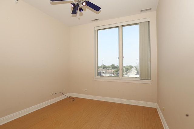 4330 N Neva Ave Unit 411, Norridge, IL 60706 - unfurnished room with light wood finished floors and ceiling fan