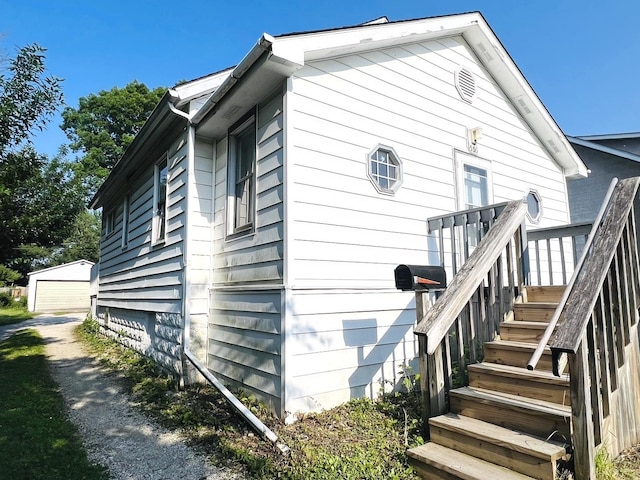 506 Scribner St, Joliet, IL 60432 - view of property exterior with stairs and an outdoor structure