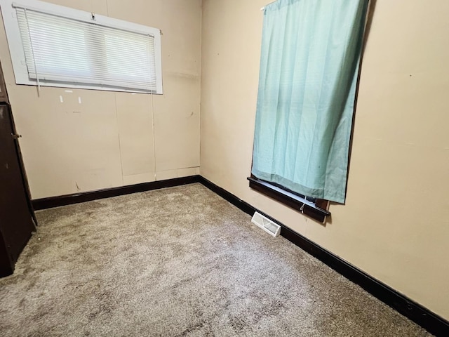 506 Scribner St, Joliet, IL 60432 - carpeted spare room with baseboards