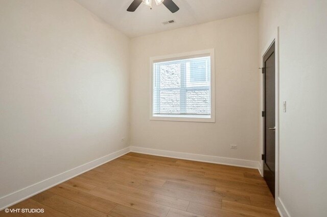 456 E Oakwood Blvd Unit 3, Chicago, IL 60653 - unfurnished room with a ceiling fan, light wood finished floors, and baseboards