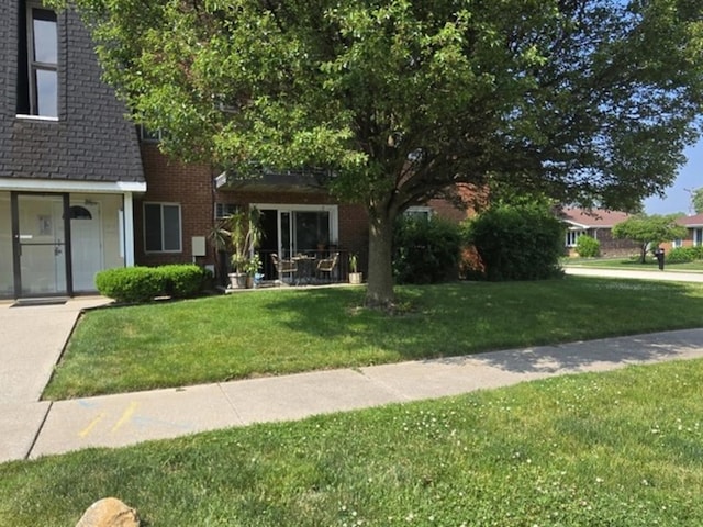 12850 Crestbrook Ct Unit 3, Crestwood, IL 60418 - view of front of home featuring a front lawn and brick siding