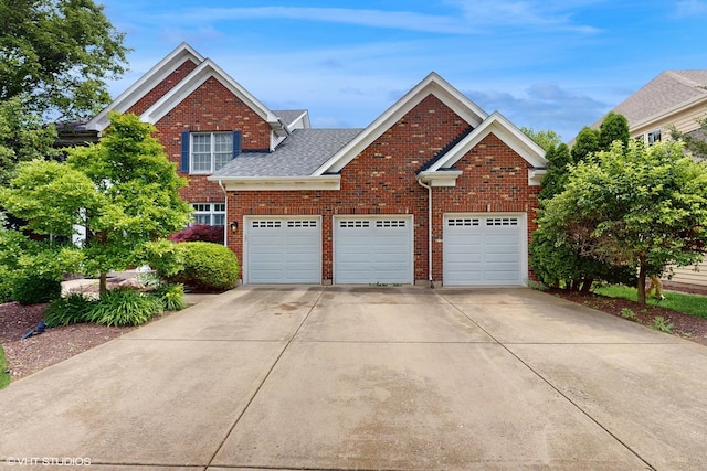3432 Redwing Dr, Naperville, IL 60564 - traditional home featuring concrete driveway, brick siding, an attached garage, and a shingled roof