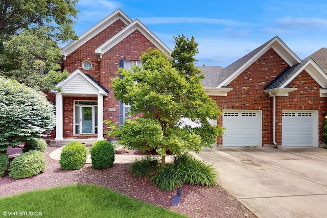 3432 Redwing Dr, Naperville, IL 60564 - traditional-style house featuring concrete driveway, brick siding, and a shingled roof