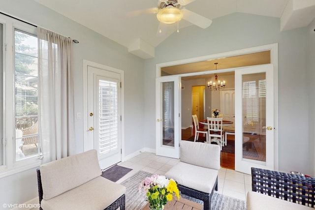 3432 Redwing Dr, Naperville, IL 60564 - living room with french doors, light tile patterned floors, a chandelier, vaulted ceiling, and plenty of natural light