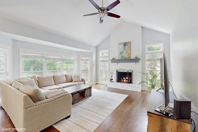 3432 Redwing Dr, Naperville, IL 60564 - living room with plenty of natural light, high vaulted ceiling, a fireplace, and a ceiling fan