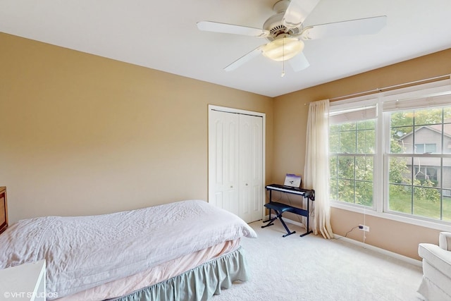 3432 Redwing Dr, Naperville, IL 60564 - bedroom with light carpet, multiple windows, a closet, and a ceiling fan
