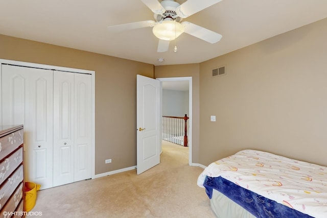 3432 Redwing Dr, Naperville, IL 60564 - bedroom with light colored carpet, a closet, and a ceiling fan