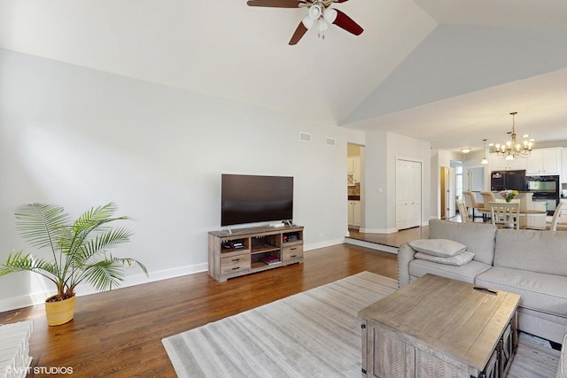 3432 Redwing Dr, Naperville, IL 60564 - living area with ceiling fan, a chandelier, wood finished floors, and high vaulted ceiling
