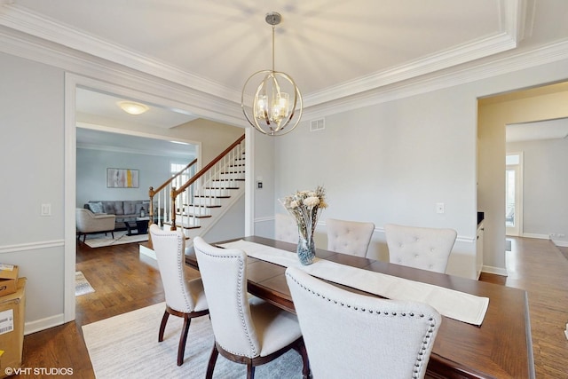 3432 Redwing Dr, Naperville, IL 60564 - dining room with a chandelier, stairway, crown molding, and wood finished floors