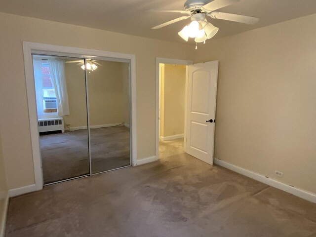 2834 W Granville Ave Unit 2A, Chicago, IL 60659 - unfurnished bedroom featuring radiator, carpet, a closet, baseboards, and ceiling fan