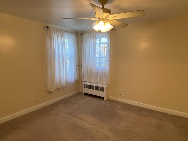 2834 W Granville Ave Unit 2A, Chicago, IL 60659 - unfurnished room featuring radiator, baseboards, carpet floors, and a ceiling fan