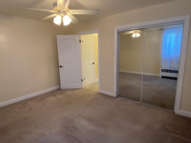 2834 W Granville Ave Unit 2A, Chicago, IL 60659 - unfurnished bedroom featuring radiator, carpet flooring, a closet, and baseboards
