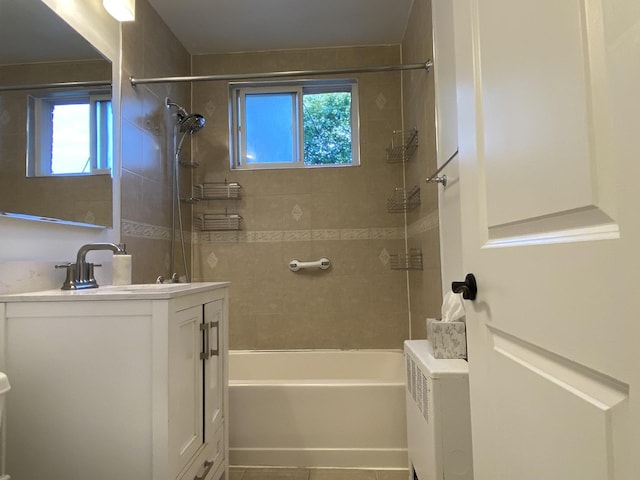 2834 W Granville Ave Unit 2A, Chicago, IL 60659 - bathroom featuring vanity, washtub / shower combination, and tile patterned floors