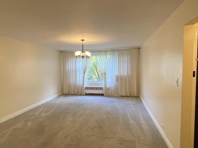 2834 W Granville Ave Unit 2A, Chicago, IL 60659 - carpeted spare room with radiator heating unit, a chandelier, and baseboards