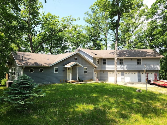 1115/1114 Windyhill Ct, Varna, IL 61375 - view of front of house featuring a garage, a front lawn, central air condition unit, and driveway