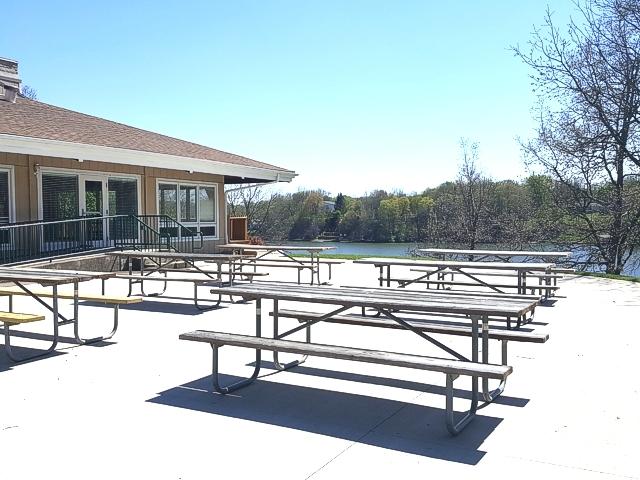 1115/1114 Windyhill Ct, Varna, IL 61375 - surrounding community with a water view, a wooded view, and a patio area