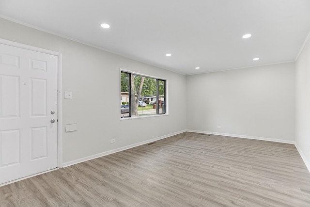463 Tahoe St, Park Forest, IL 60466 - spare room featuring light wood finished floors, recessed lighting, and ornamental molding