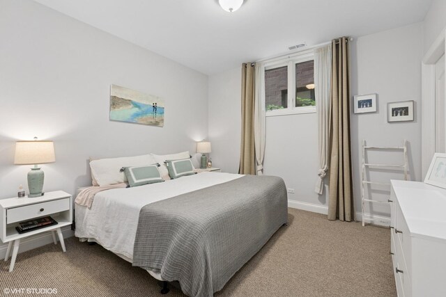 3020 N Sheffield Ave Unit 1N, Chicago, IL 60657 - bedroom with light carpet and baseboards