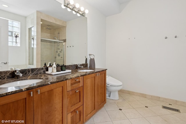 3020 N Sheffield Ave Unit 1N, Chicago, IL 60657 - bathroom with a shower stall and double vanity