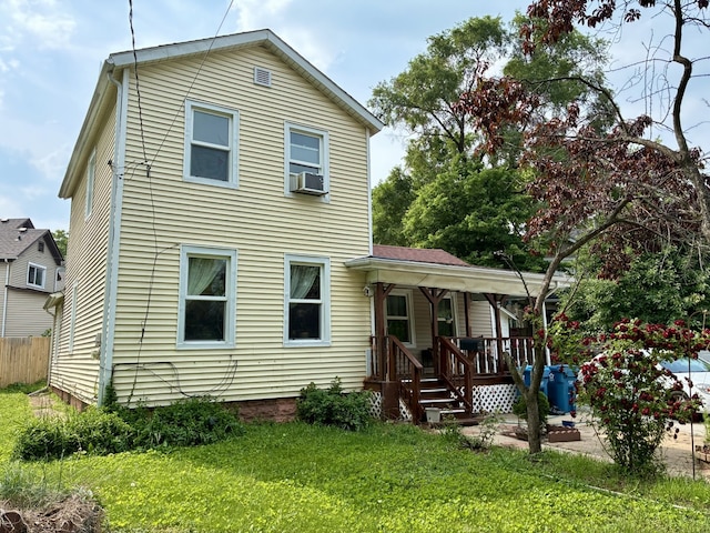 160 N Root St, Aurora, IL 60505 - rear view of house featuring covered porch and cooling unit