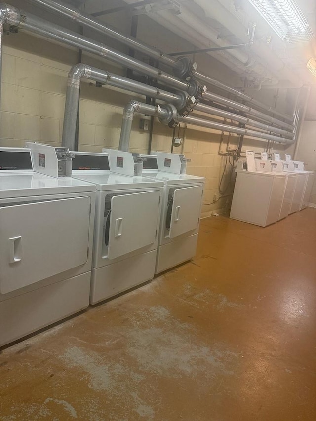 345 E Eastgate Pl Unit 505, Chicago, IL 60616 - laundry area with washing machine and dryer and concrete block wall