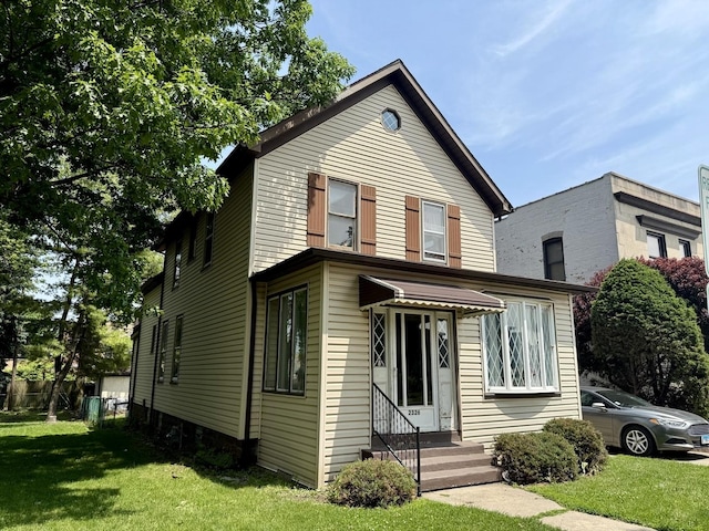 2326 Walnut St, Blue Island, IL 60406 - view of front of house with a front lawn and entry steps