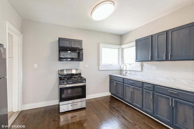3000 Chicago Rd, South Chicago Heights, IL 60411 - kitchen featuring stainless steel gas range, black microwave, a sink, baseboards, and dark wood-type flooring
