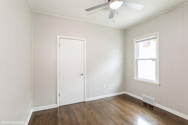 3000 Chicago Rd, South Chicago Heights, IL 60411 - unfurnished room featuring dark wood finished floors, a ceiling fan, and baseboards