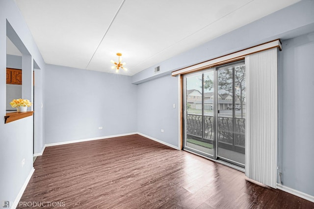 8124 168th Pl Unit 1E, Tinley Park, IL 60477 - spare room with wood finished floors and baseboards