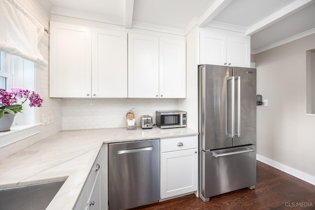 1405 Cynthia Ave, Park Ridge, IL 60068 - kitchen featuring stainless steel appliances, light stone counters, decorative backsplash, and white cabinetry