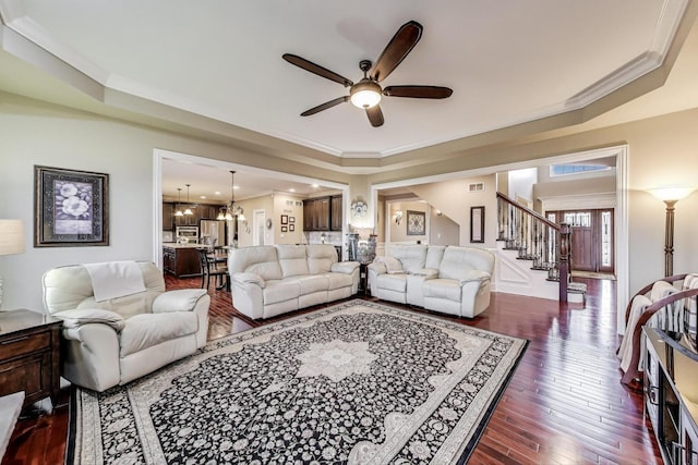 22814 Sara Springs Dr, Frankfort, IL 60423 - living area with a ceiling fan, stairs, dark wood-style floors, and crown molding