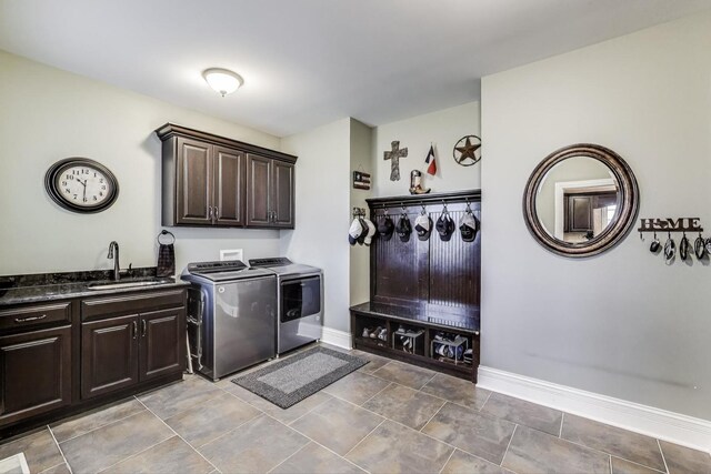 22814 Sara Springs Dr, Frankfort, IL 60423 - washroom featuring washing machine and clothes dryer, cabinet space, and baseboards