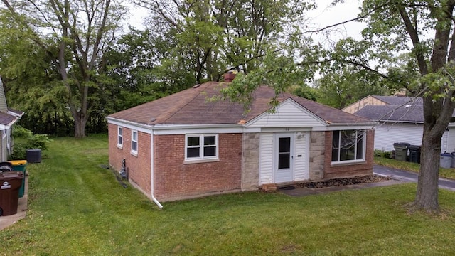 336 Manitowac St, Park Forest, IL 60466 - single story home with a front yard, brick siding, and a shingled roof