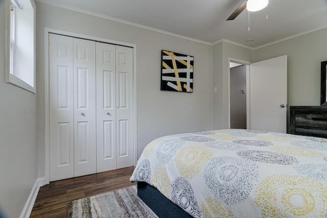 336 Manitowac St, Park Forest, IL 60466 - bedroom featuring dark wood-type flooring, crown molding, a closet, and a ceiling fan