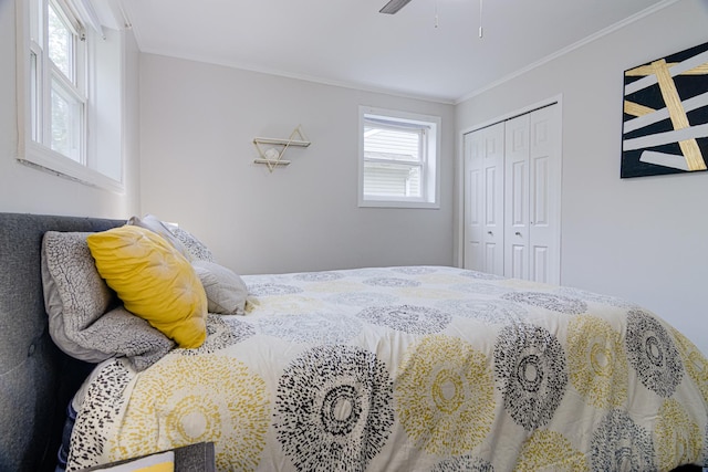 336 Manitowac St, Park Forest, IL 60466 - bedroom featuring a closet, ornamental molding, and ceiling fan