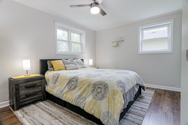 336 Manitowac St, Park Forest, IL 60466 - bedroom featuring multiple windows, wood finished floors, ornamental molding, and a ceiling fan