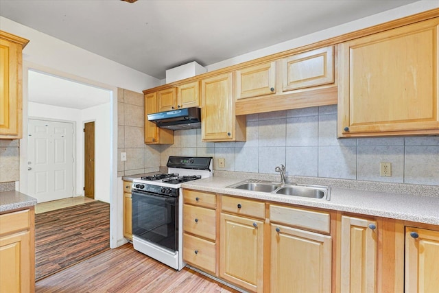 1305 W Beardsley Ave, Urbana, IL 61801 - kitchen featuring white gas stove, under cabinet range hood, backsplash, and light brown cabinets