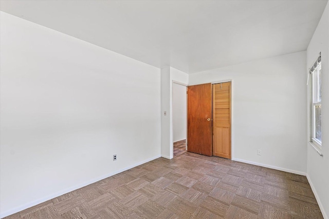 1305 W Beardsley Ave, Urbana, IL 61801 - empty room with baseboards
