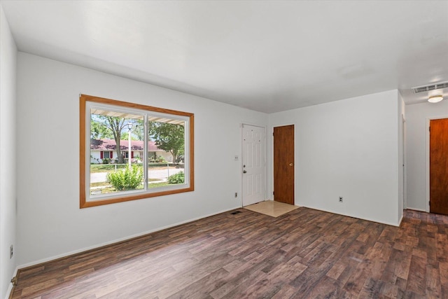 1305 W Beardsley Ave, Urbana, IL 61801 - empty room featuring wood finished floors