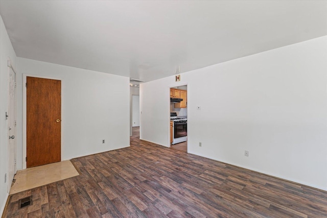 1305 W Beardsley Ave, Urbana, IL 61801 - unfurnished living room with dark wood-style floors