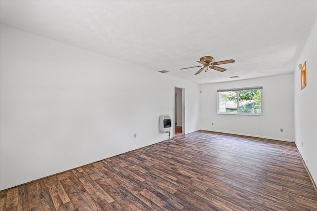 1305 W Beardsley Ave, Urbana, IL 61801 - unfurnished living room with heating unit, wood finished floors, and ceiling fan
