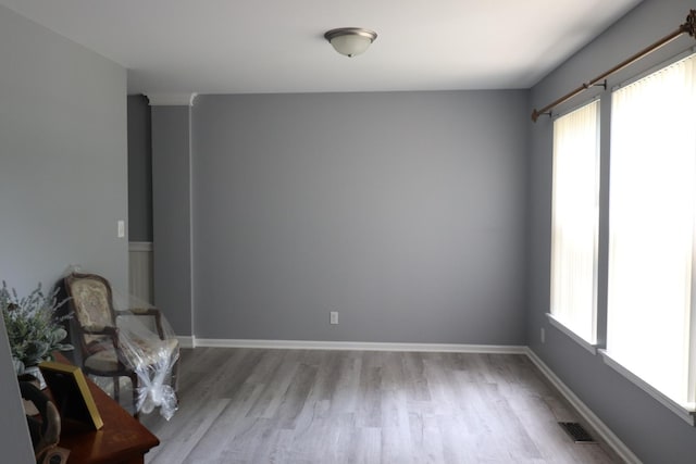2886 E 6th St, Belvidere, IL 61008 - empty room with wood finished floors and baseboards