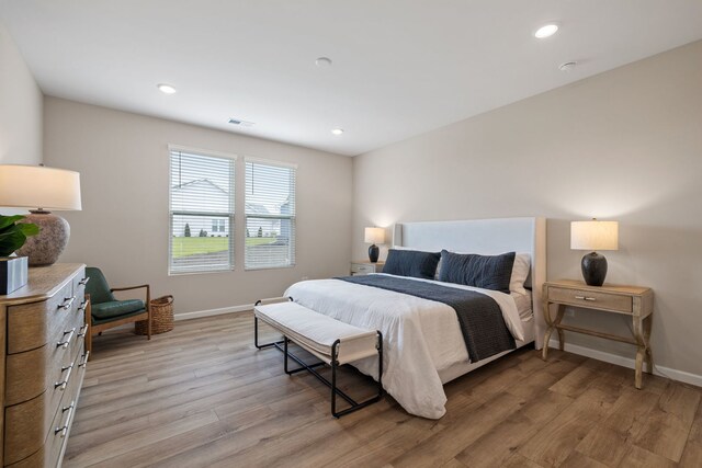 3214 Lincoln Prairie Blvd, Aurora, IL 60503 - bedroom with light wood-type flooring, baseboards, and recessed lighting